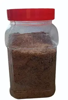 Medium transparent plastic storage jar with screw lid for spices and dry ingredients.